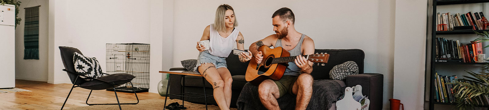 Young couple in their living room.